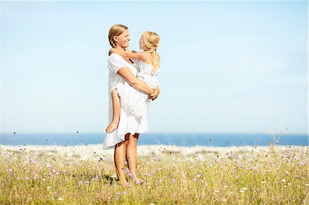 simsearch:6102-08329857,k - Mother with daughter on meadow Stock Photo - Premium Royalty-Free, Code: 6102-08271817