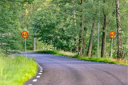 simsearch:6102-08384061,k - Country road with speed limit sign Stock Photo - Premium Royalty-Free, Code: 6102-08384061