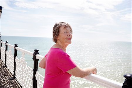 dock side view - Senior woman looking at sea Stock Photo - Premium Royalty-Free, Code: 6102-08384230