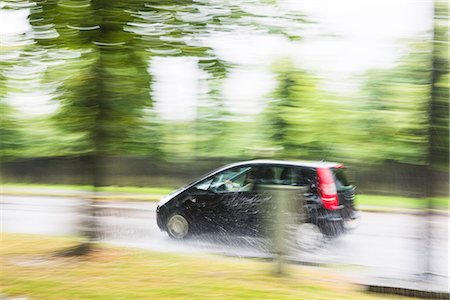 Car on wet road Stock Photo - Premium Royalty-Free, Code: 6102-08384387