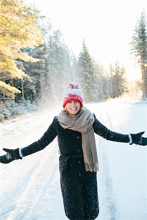 snow laugh - Smiling woman at winter Stock Photo - Premium Royalty-Free, Code: 6102-08384493