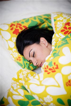 simsearch:6102-08001463,k - Woman sleeping in bed Stock Photo - Premium Royalty-Free, Code: 6102-08388159