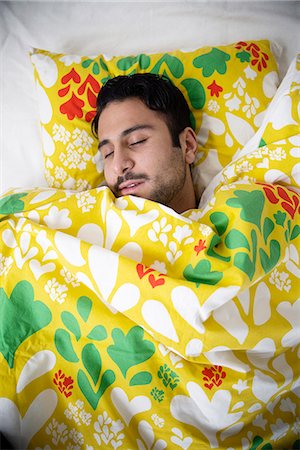 simsearch:6102-08001463,k - Man sleeping in bed Stock Photo - Premium Royalty-Free, Code: 6102-08388160