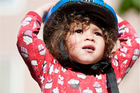 simsearch:6102-08388011,k - Small girl in bicycle helmet Photographie de stock - Premium Libres de Droits, Code: 6102-08388437
