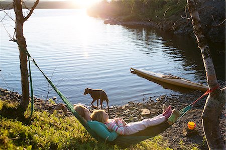 family on hammock - Mother with daughter at coast Foto de stock - Sin royalties Premium, Código: 6102-08329596