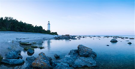 Lighthouse at coast Stock Photo - Premium Royalty-Free, Code: 6102-08480907