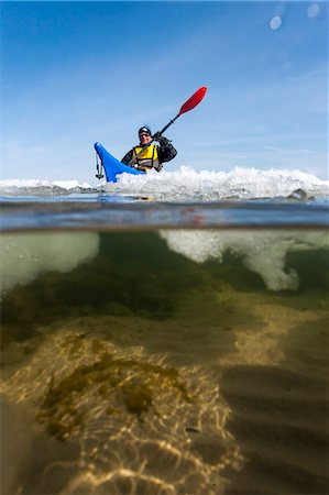 people on boat with underwater view - Person kayaking on sea Stock Photo - Premium Royalty-Free, Code: 6102-08481016