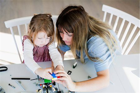 simsearch:6102-08942558,k - Mother and daughter playing Stock Photo - Premium Royalty-Free, Code: 6102-08542295