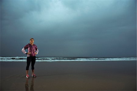 female triathlon - Athlete woman standing on beach Stock Photo - Premium Royalty-Free, Code: 6102-08558966