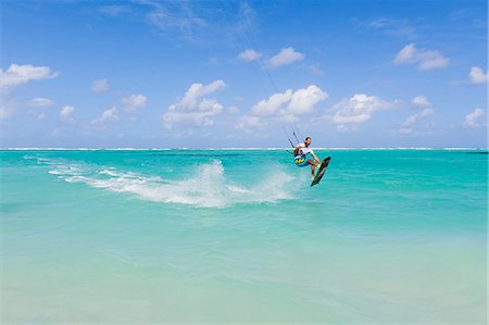 simsearch:640-03257107,k - Mid adult man kite surfing Stock Photo - Premium Royalty-Free, Code: 6102-08559049