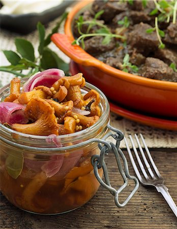 simsearch:6102-03748334,k - Chanterelles with red onion in jar Stock Photo - Premium Royalty-Free, Code: 6102-08559168