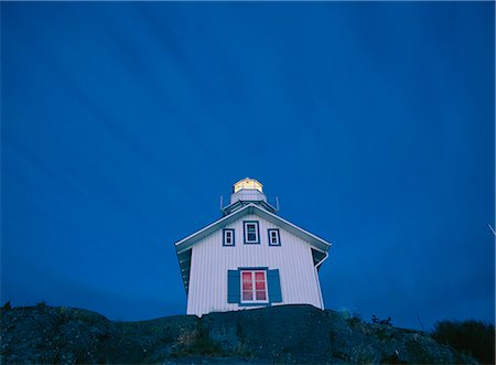 Lighthouse, low angle view Stock Photo - Premium Royalty-Free, Code: 6102-08559186
