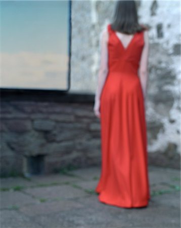 defocus - A Woman in a Red Evening Dress. Stock Photo - Premium Royalty-Free, Code: 6102-08559123