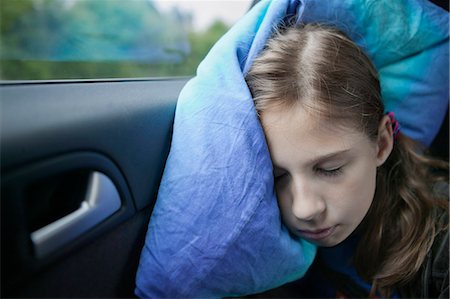 simsearch:6102-08942601,k - Girl sleeping in car Stock Photo - Premium Royalty-Free, Code: 6102-08559204