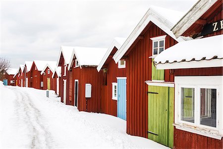 Fishing huts at winter, Halleviksstrand, Vastkusten, Orust, Bohuslan, Sweden Foto de stock - Royalty Free Premium, Número: 6102-08559324