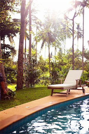 simsearch:6102-08001278,k - Thailand, sun lounger by swimming pool Stock Photo - Premium Royalty-Free, Code: 6102-08566066