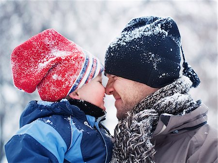 simsearch:6102-08384404,k - Father and son togetherness at winter Stock Photo - Premium Royalty-Free, Code: 6102-08566247