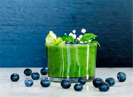 smoothie with fruits - Blueberries and green smoothie Stock Photo - Premium Royalty-Free, Code: 6102-08566643