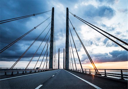 simsearch:6102-07843735,k - Cable bridge at sunset Foto de stock - Sin royalties Premium, Código: 6102-08566721