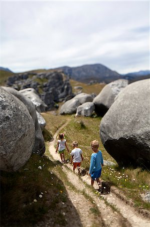 Children walking in mountains Stock Photo - Premium Royalty-Free, Code: 6102-08566733