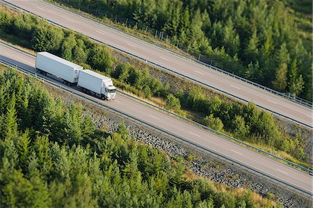 simsearch:6102-08520618,k - White semi-truck on road Stock Photo - Premium Royalty-Free, Code: 6102-08520623