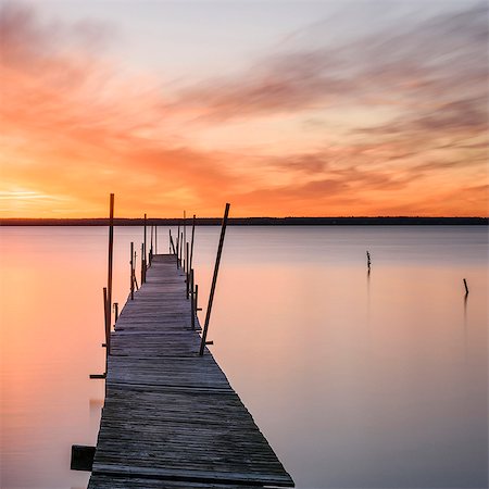 simsearch:6102-08388027,k - Wooden pier and lake at sunset Stockbilder - Premium RF Lizenzfrei, Bildnummer: 6102-08520716