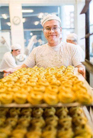 panificio - Baker working in bakery Fotografie stock - Premium Royalty-Free, Codice: 6102-08520990