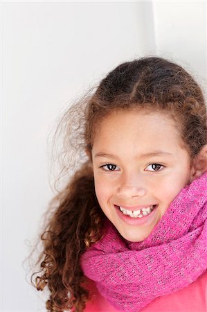 simsearch:6102-08521062,k - Portrait of smiling girl in scarf Photographie de stock - Premium Libres de Droits, Code: 6102-08521042