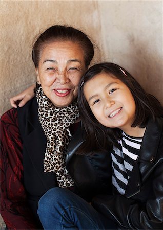 stockholm city hall - Girl embracing her grandmother Stock Photo - Premium Royalty-Free, Code: 6102-08746166