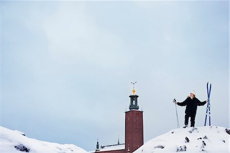 Skier on the top of a pile of snow. Stock Photo - Premium Royalty-Free, Code: 6102-08746197