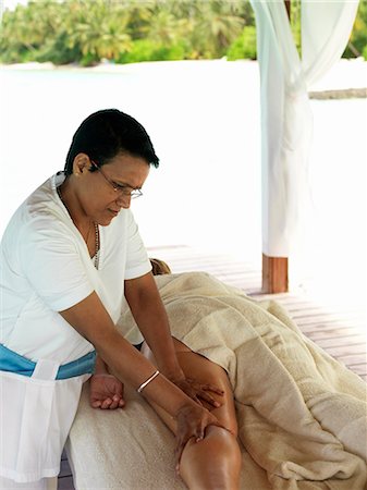 simsearch:6102-08995863,k - Woman having massage Stock Photo - Premium Royalty-Free, Code: 6102-08746417