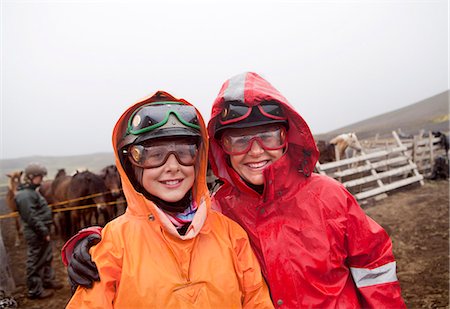 scandinavia horse - Portrait of woman and girl wearing raincoats and protective eyewear Stock Photo - Premium Royalty-Free, Code: 6102-08746575