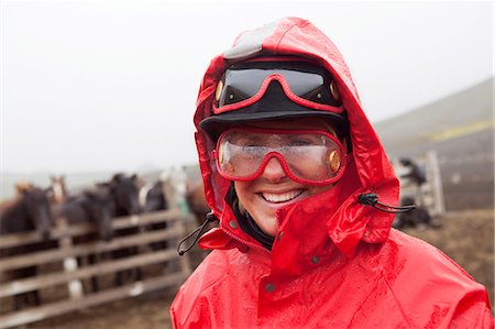 raincoat hood - Portrait of woman wearing raincoat and protective eyewear Stock Photo - Premium Royalty-Free, Code: 6102-08746576