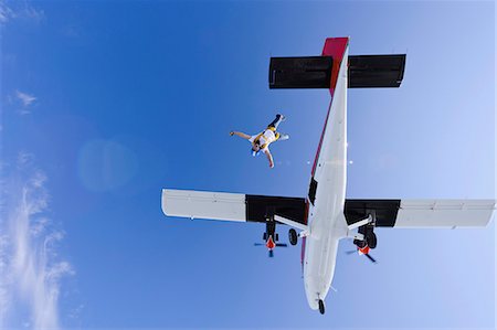 simsearch:6102-08001432,k - Parachutists jumping from airplane Photographie de stock - Premium Libres de Droits, Code: 6102-08746535