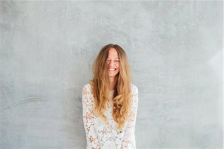 stringing - Portrait of happy woman Photographie de stock - Premium Libres de Droits, Code: 6102-08746883