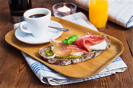 Sandwich and coffee on tray Stock Photo - Premium Royalty-Free, Code: 6102-08746962