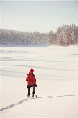point of view - Woman walking through snow Stock Photo - Premium Royalty-Free, Code: 6102-08746978