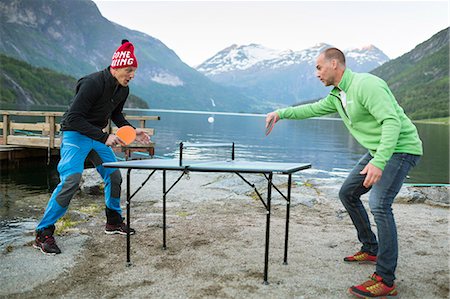 play with water people - Men playing table tennis at lake Stock Photo - Premium Royalty-Free, Code: 6102-08747024