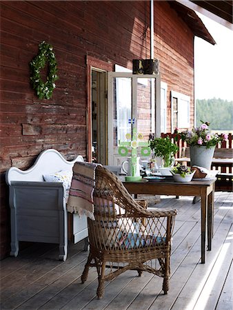 dinner on the couch - Scandinavia, Sweden, Ekero, View of porch Stock Photo - Premium Royalty-Free, Code: 6102-08748422