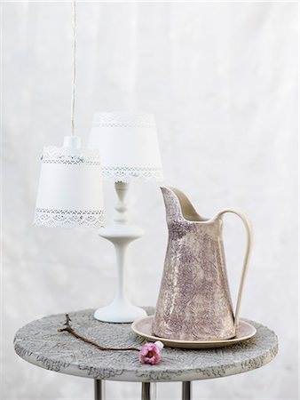 simsearch:6102-08942322,k - Scandinavia, Sweden, Stockholm, View of jug with table lamp on table, close-up Photographie de stock - Premium Libres de Droits, Code: 6102-08748424