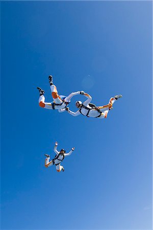 People parachuting Stock Photo - Premium Royalty-Free, Code: 6102-08748597