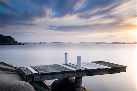 simsearch:6102-08858753,k - View of sea, clouds and jetty Stockbilder - Premium RF Lizenzfrei, Bildnummer: 6102-08760282