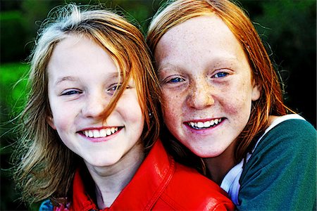 Portrait of smiling girls Stock Photo - Premium Royalty-Free, Code: 6102-08760367