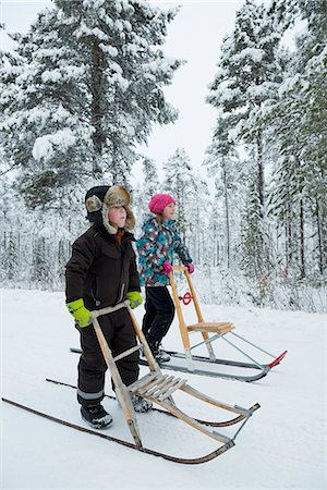 simsearch:6102-08995475,k - Children on kicksleds Stock Photo - Premium Royalty-Free, Code: 6102-08760388