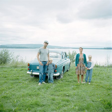 retro south america - Family standing in front of car Stock Photo - Premium Royalty-Free, Code: 6102-08760598