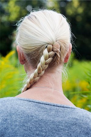 Close-up of womans braid Photographie de stock - Premium Libres de Droits, Code: 6102-08760660