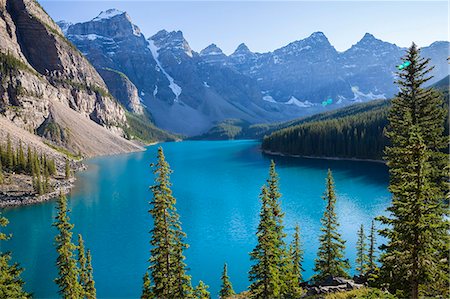 snow capped mountain canada - Scenic view of turquoise lake, Rocky Mountains Stock Photo - Premium Royalty-Free, Code: 6102-08760693