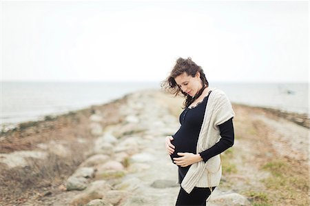 Pregnant woman at sea Stock Photo - Premium Royalty-Free, Code: 6102-08760818