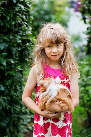 simsearch:6102-08480863,k - Girl with guinea-pig, Sollentuna, Stockholm, Sweden Stock Photo - Premium Royalty-Free, Code: 6102-08761155