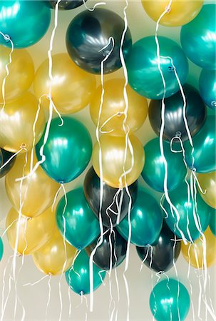 Yellow balloon with string Stock Photos - Page 1 : Masterfile